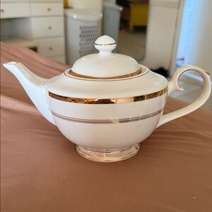 Elegant White and Gold Teapot